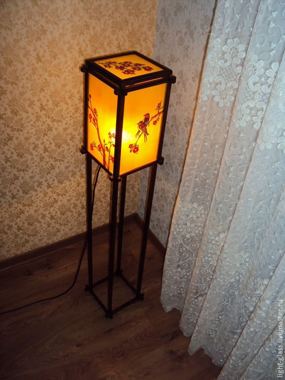 A Floor Lamp Is In Stained Glass Window Style