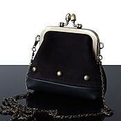 Bag with clasp: Black evening leather handbag with a long chain