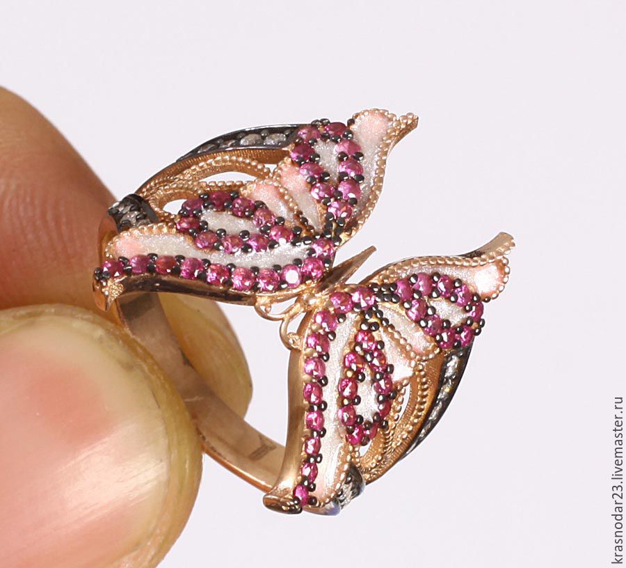 ring of 925 silver with 24 carat gold decorated with pink rubies jewelry enamel and zircons
