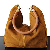 Olive suede handbag on the clasp