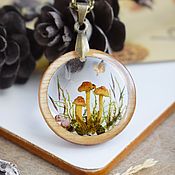 Hexagon pendant with real flowers. Ornaments from resin
