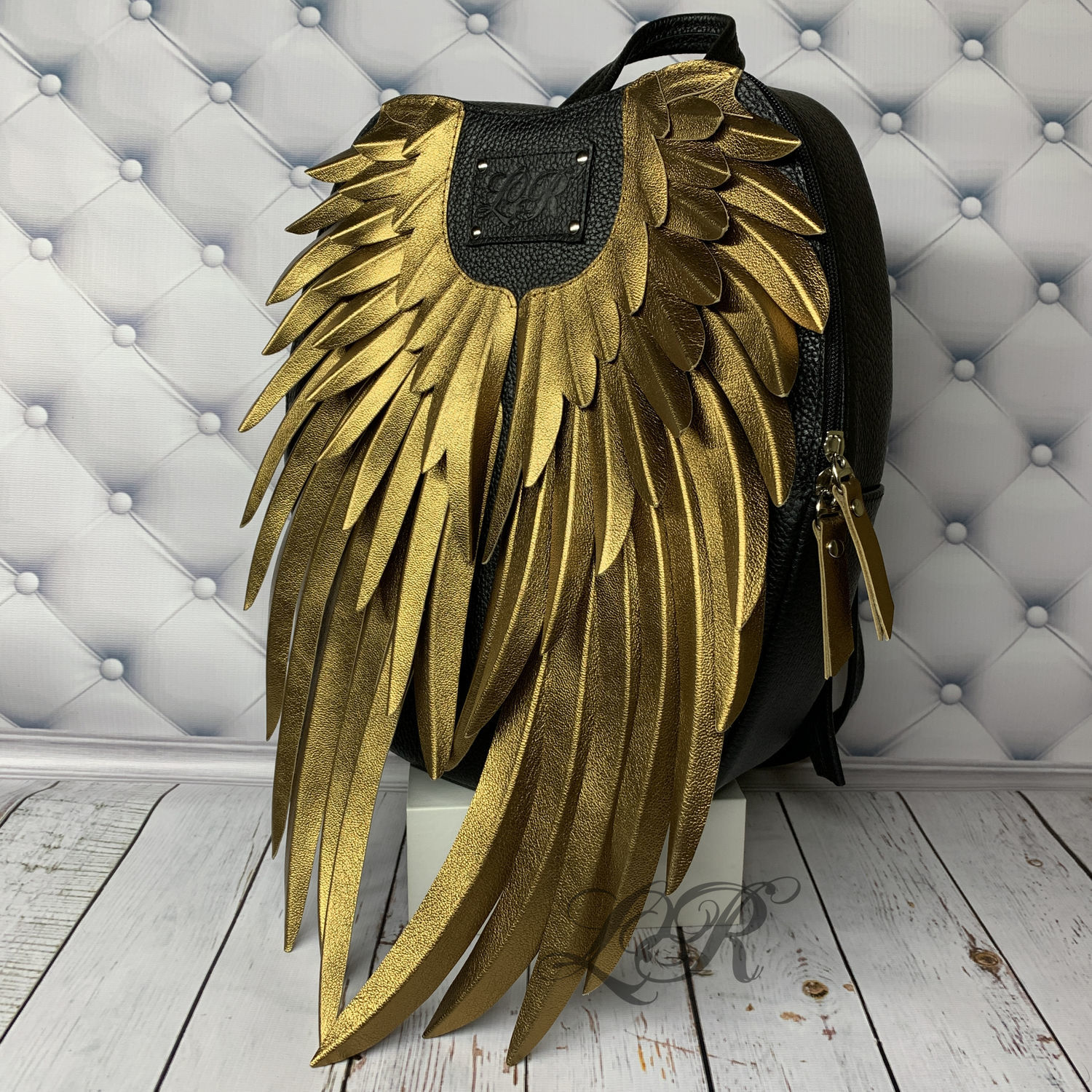 Кожаный рюкзак с крыльями