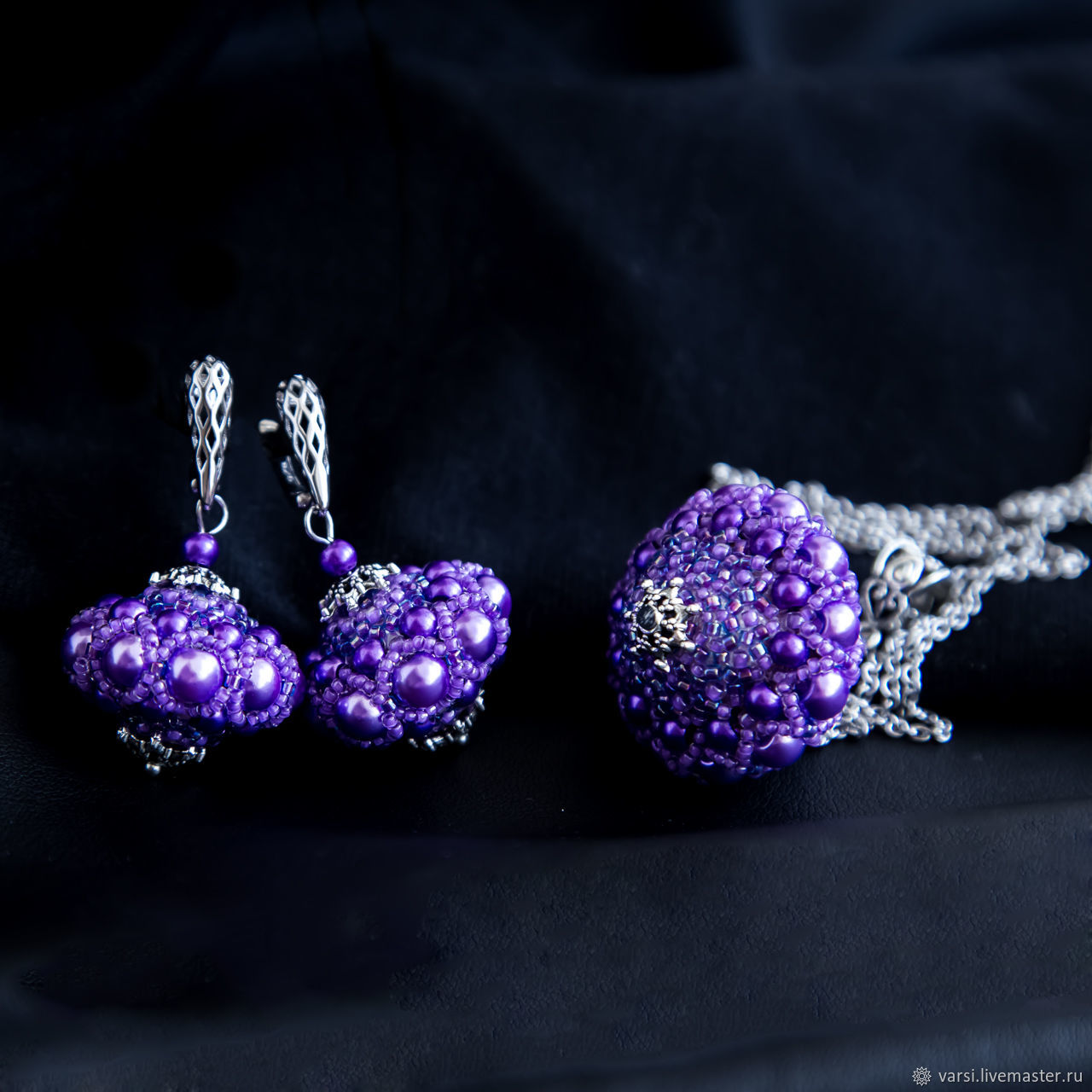 Серьги с фиолетовым камнем