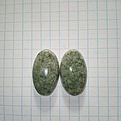 Cabochons of green jade