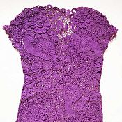 Warm knitted dress with openwork inserts