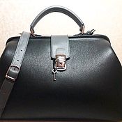 Leather bag with clasp