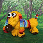 Knitted toy rainbow cat. Bright souvenir. Unusual gift