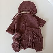 A set of clothes for a newborn made of cashmere