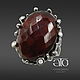 THE ONLY INSTANCE! Large ring with faceted cabochon hessonite garnet Carat 42.50.

