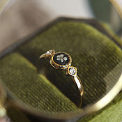 Регулируемое кольцо с цветком внутри. Кольцо серебряное из стали
