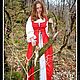 Red dress in Medieval style for a photo shoot