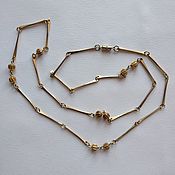 Vintage necklace made of Czech satin glass on a golden chain