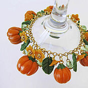 Украшения handmade. Livemaster - original item Bracelet with pumpkins and flowers from polymer clay. Decoration with pumpkin. Handmade.