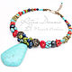 Necklace bright cheerful colors of natural stones with large turquoise pendant conjures up thoughts about the hottest time of year - summer with its variety of colors and flowers.
