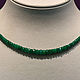 Beads of green corundum
