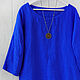 Oversize blouse made of bright blue linen
