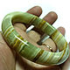 Браслет `Кружевной`
выполнен из 
цельного камня  натурального Зелёного Оникса,
высота браслета 13,5 мм,ширина камня 9 мм,
внутренний диаметр 60 мм