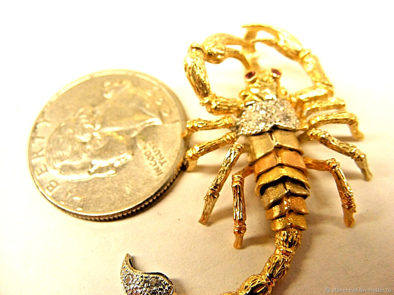 Купить золотого скорпиона
