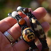 Dzi bead 9 eyes carved - Tibet. Handmade. The amulet of wealth