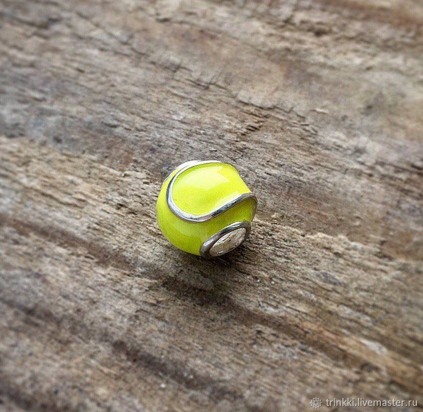 Charm volumetric tennis ball made of silver with enamel
