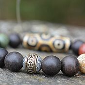 Украшения handmade. Livemaster - original item Bracelet with a rotating bead with Tibetan mantra, Ji, wu-sin. Handmade.