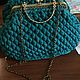 Handbag with the clasp of the knitted yarn. Inside lining bright colors. Handle chain shoulder 120 cm.
