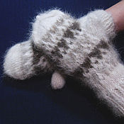 Teenage knitted set of socks and mittens