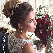 The twig in the bride's hairstyle