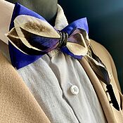 White bow tie with duck and pheasant feathers