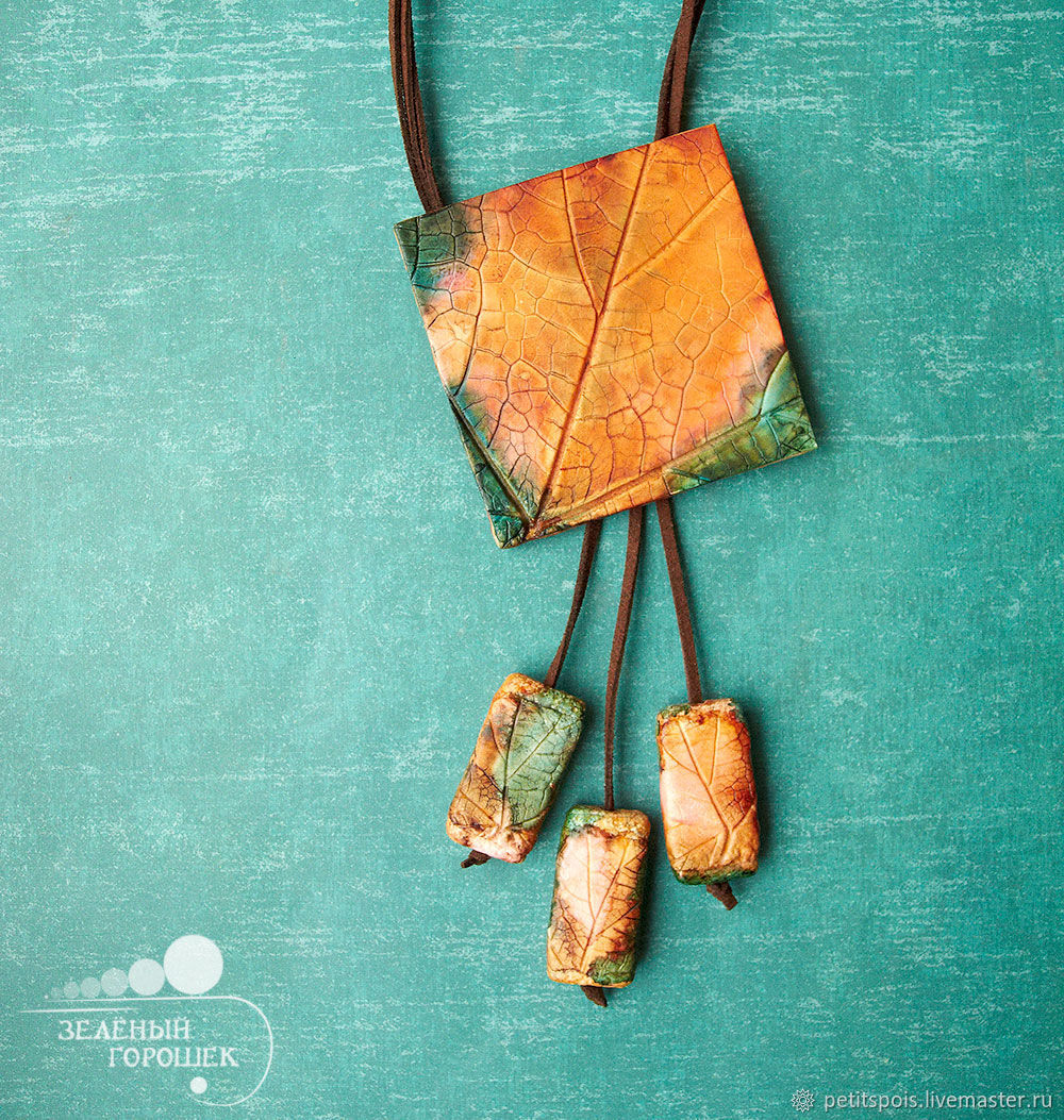 A beautiful pendant made of polymer clay will be an excellent decoration or souvenir for memory A beautiful pendant made of polymer clay will be an excellent decoration or souvenir for memory