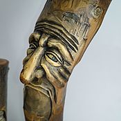 Walking stick with decorative carvings